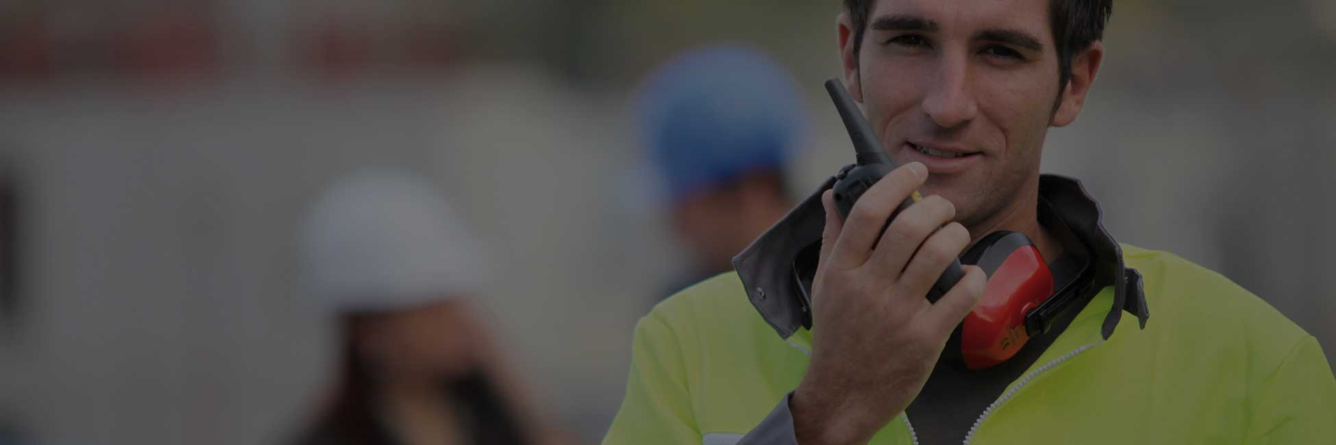 man using a two way radio