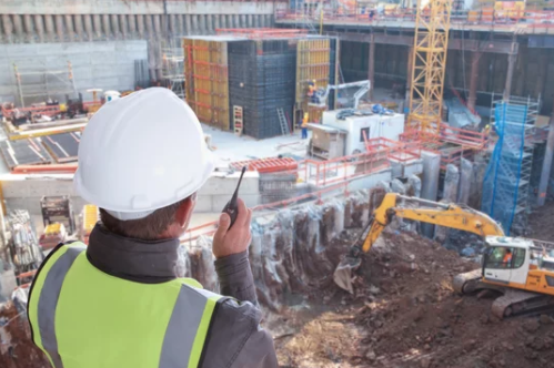 A construction working using an icom two way radios