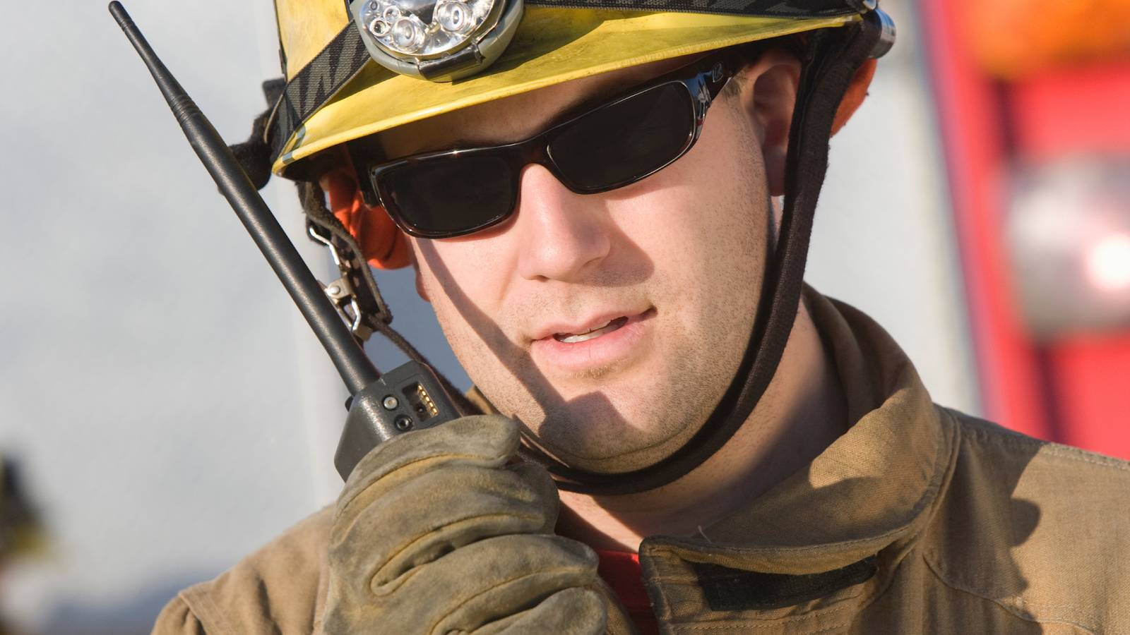 fire fighter talking on two way radios